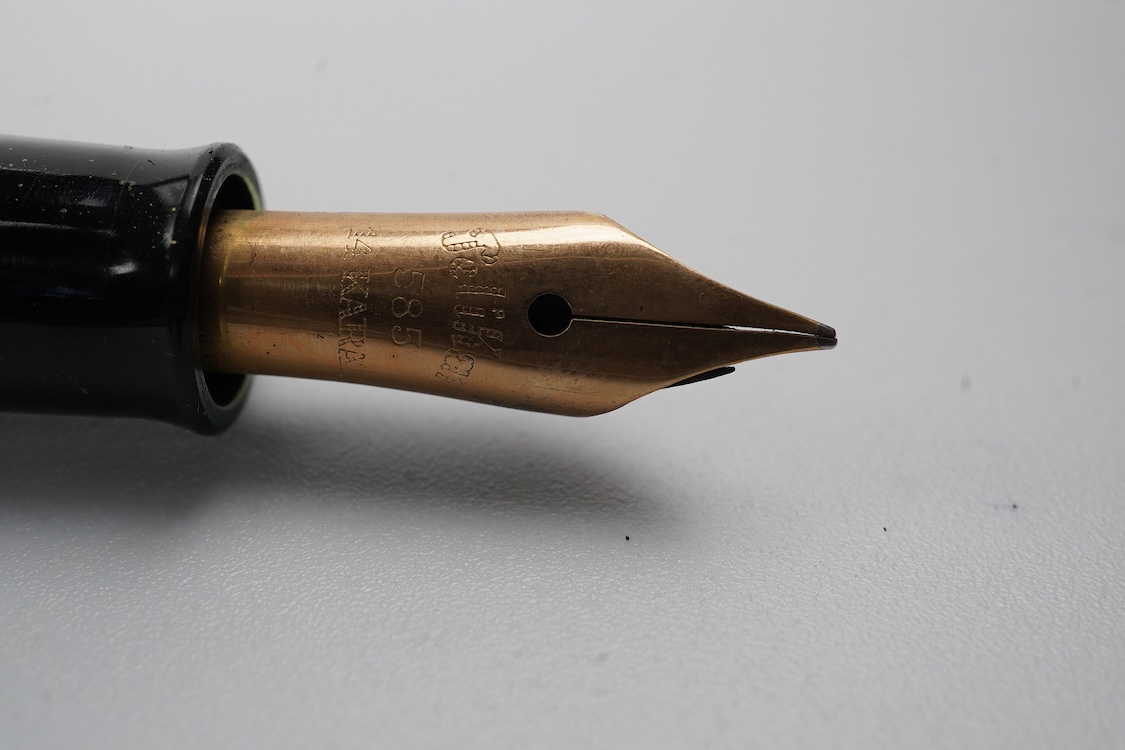 A Pelikan 100N fountain pen fitted with a 14ct. gold Pelikan nib